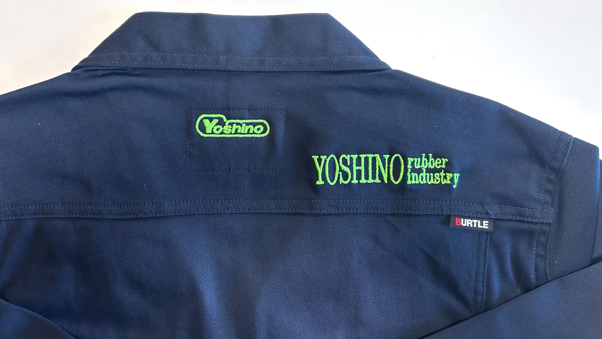 作業服加工｜吉野ゴム工業株式会社様 事例【ロゴ刺繍・プリント
